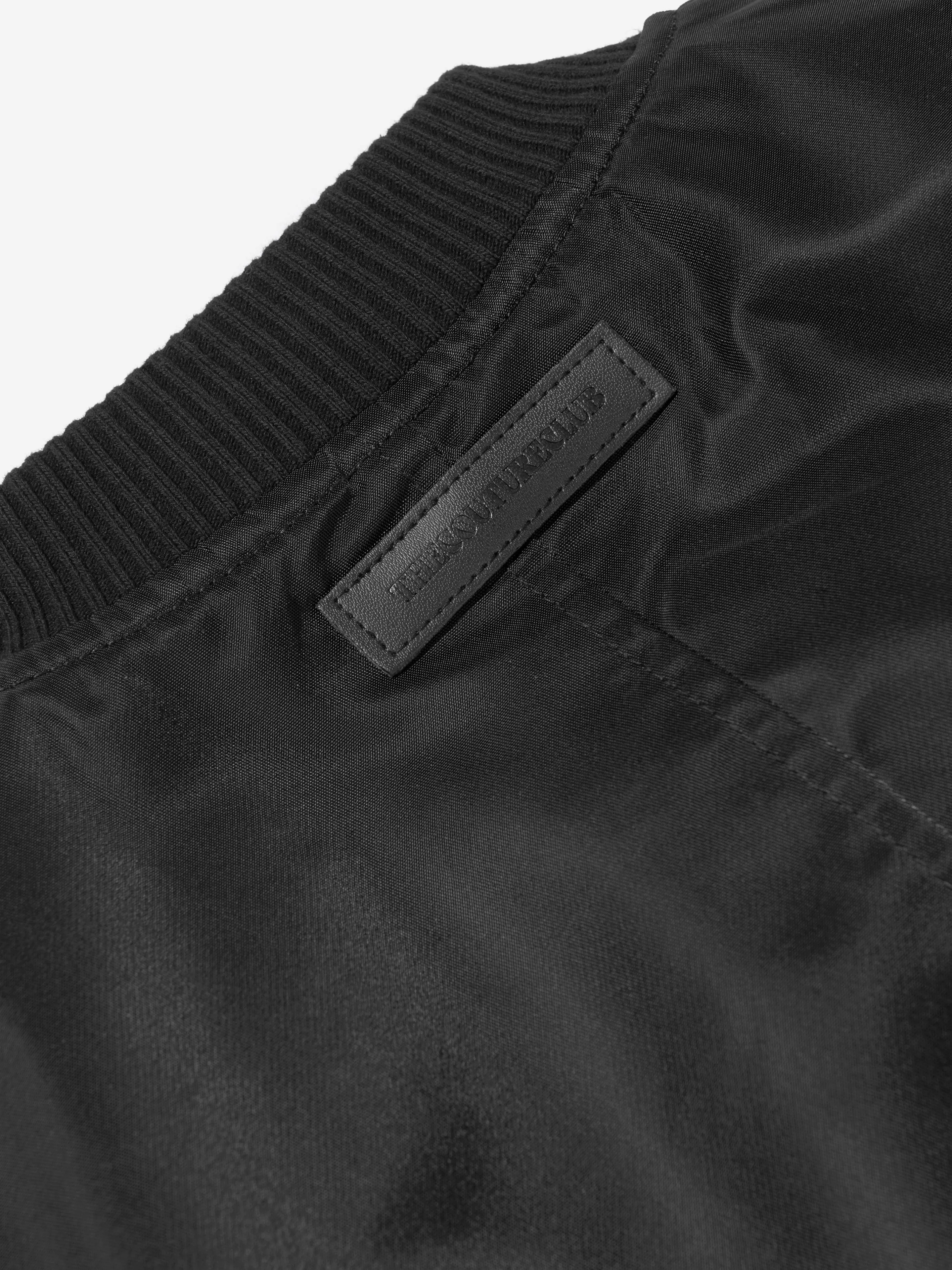 Kinder Nylon 4 Emblem Bomberjacke in Schwarz
