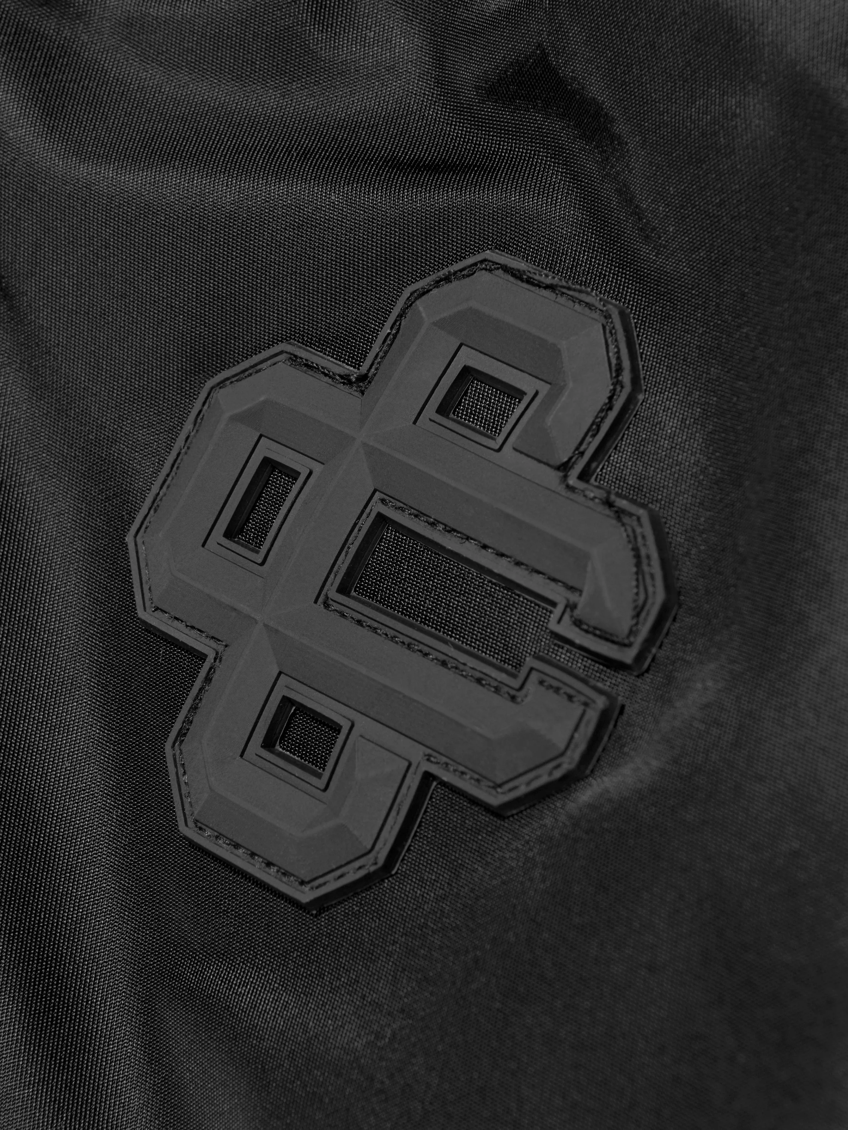 Kinder Nylon 4 Emblem Bomberjacke in Schwarz