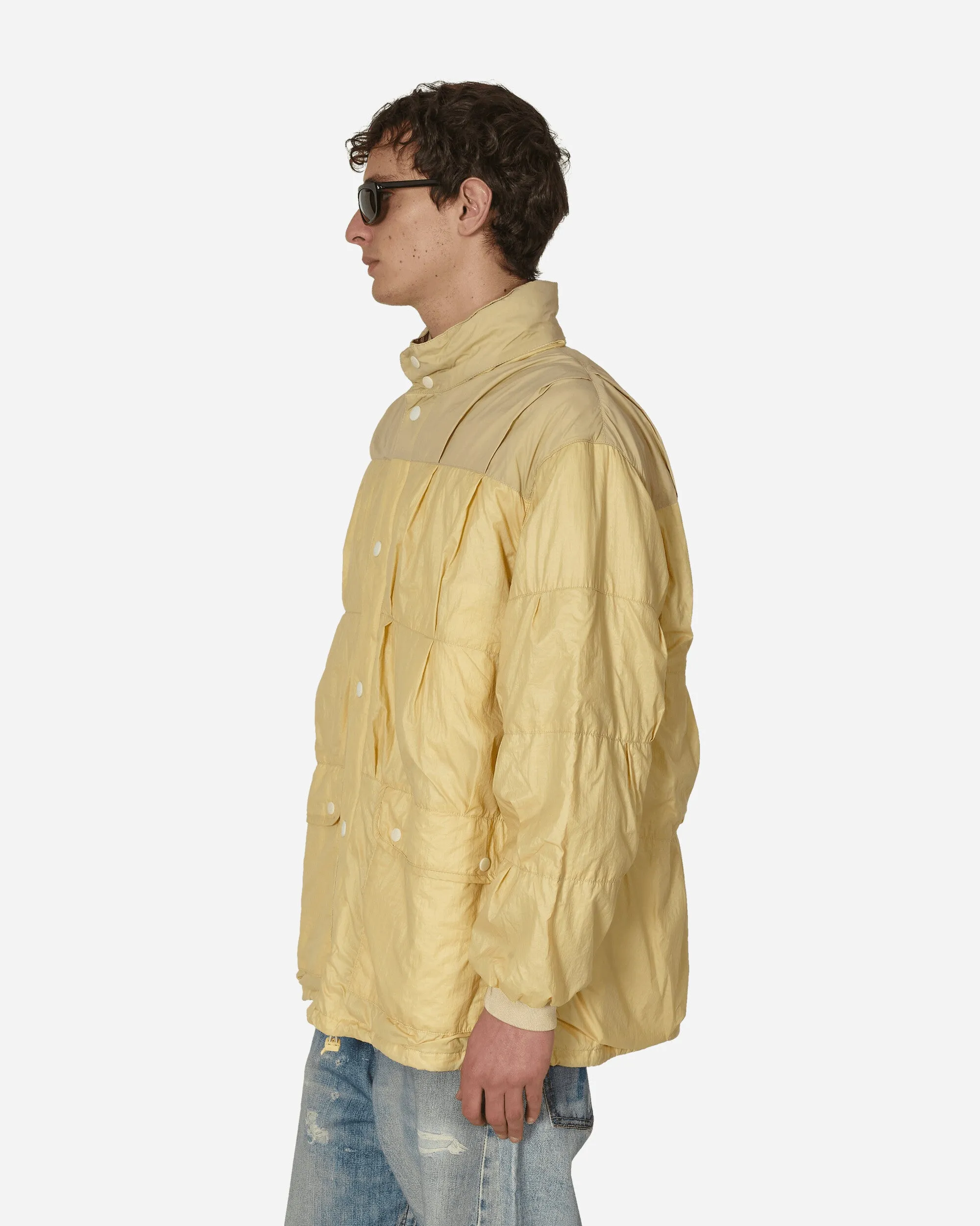 Gummierter Nylon-Puffa-Mantel in Creme