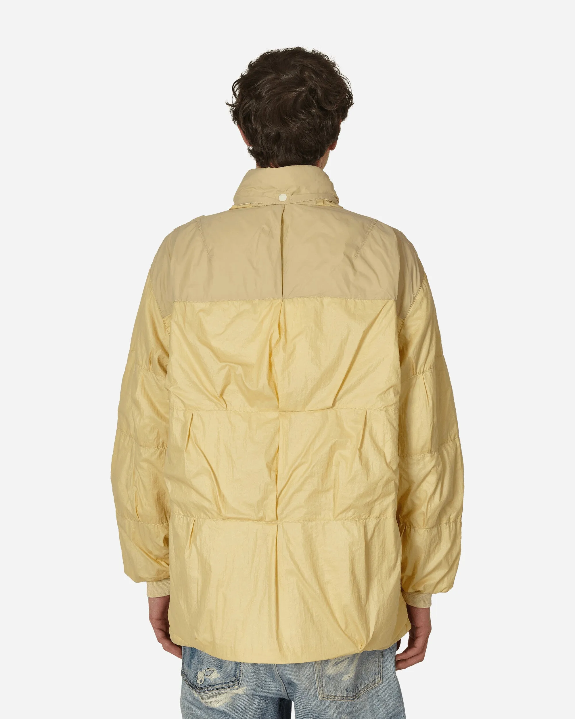 Gummierter Nylon-Puffa-Mantel in Creme