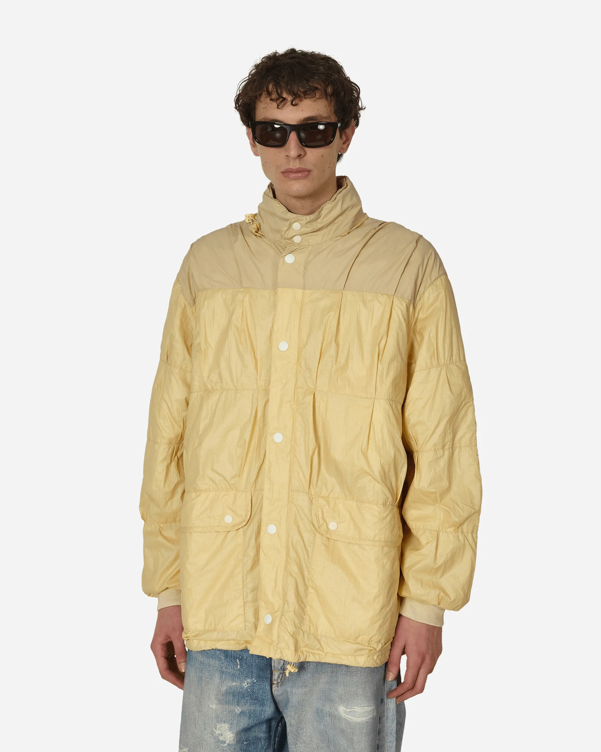 Gummierter Nylon-Puffa-Mantel in Creme