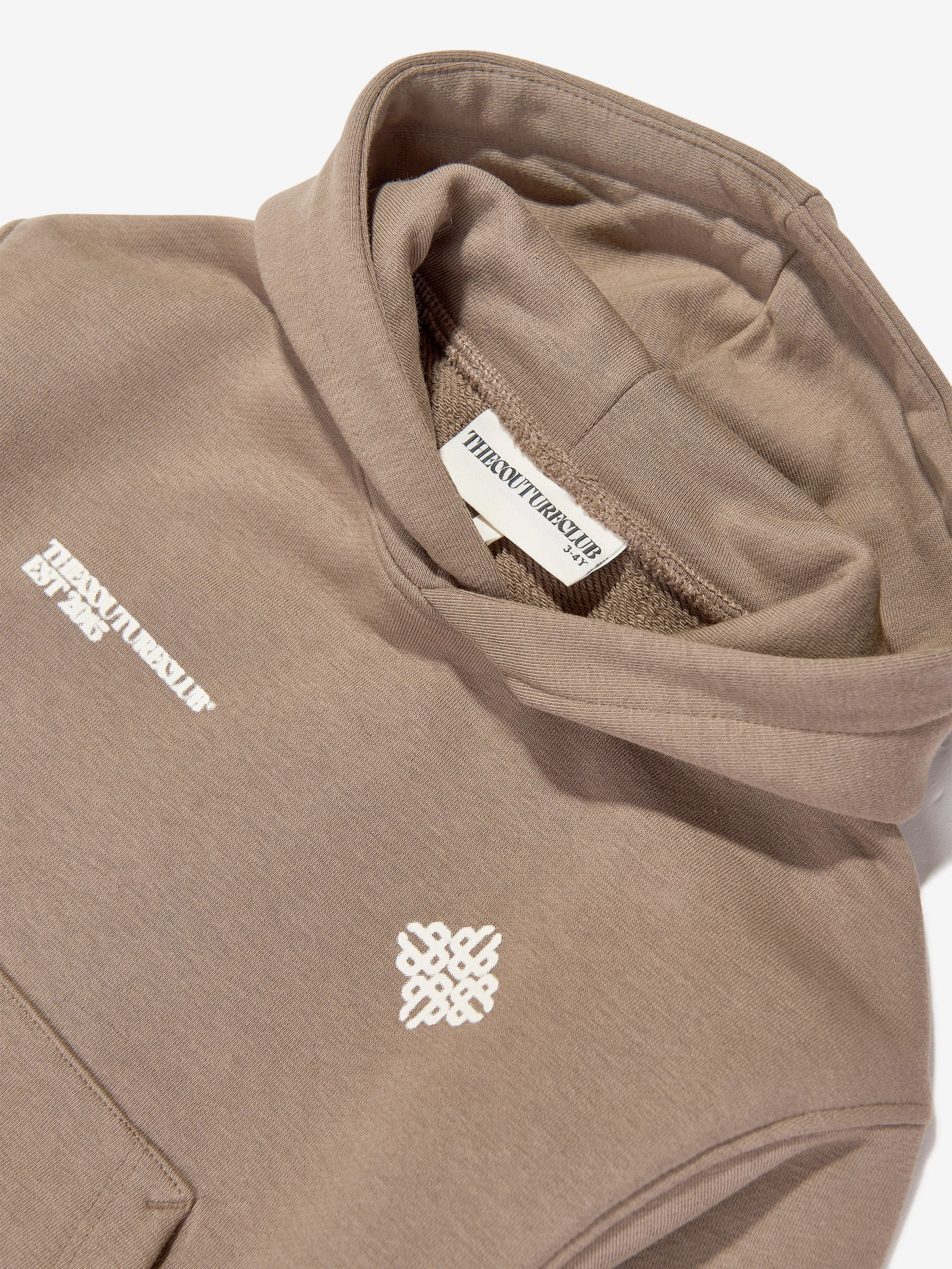 The Couture Club Kids Hoodie mit verschwommenem Emblem-Motiv in Braun
